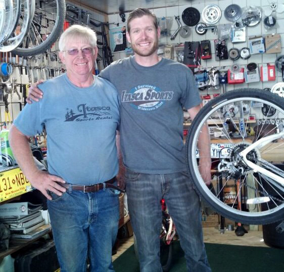 Sam and his dad at the bike shop at Itasca State Park