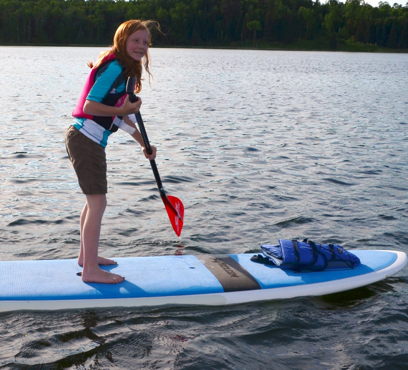 Stand-up paddleboarding at Itasca State Park